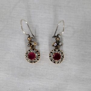 Costume earrings with false diamonds and rubies